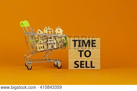 Time To Sell Real Estate Symbol. Wooden Blocks, Words 'time To Sell' On Beautiful Orange Background.