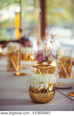 Restaurant Table Setout With White Plates And Silverware