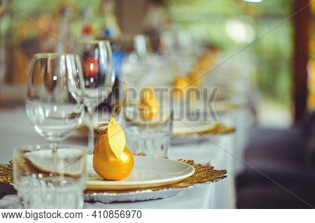 Restaurant Table Setout With White Plates And Silverware