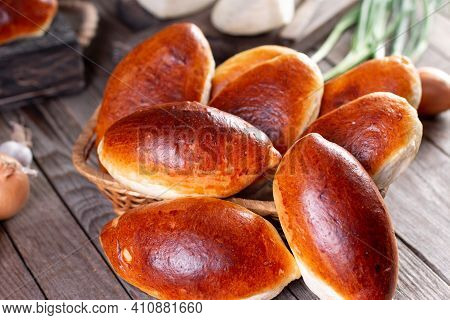 Russian Pastries (pirogi) Filled With Eggs And Green Onion