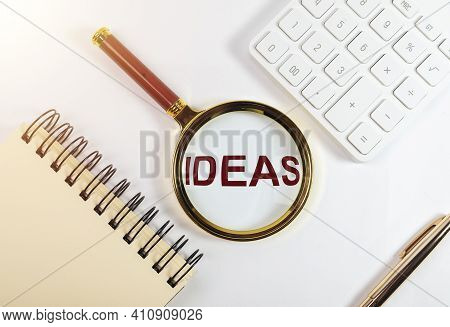Word Ideas Throgh Magnifying Glass, Top View.