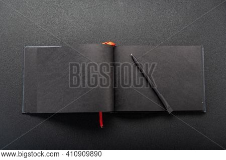 Notebook On The Table. Notepad On The Table. An Expanded Journal For Writing On The Table. Top.