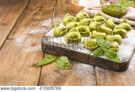 Tortellini E Tortelloni Typical Dishes Emilia Italy. Food Background With Homemade Raw Italian Torte