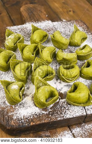 Tortellini E Tortelloni Typical Dishes Emilia Italy. Food Background With Homemade Raw Italian Torte