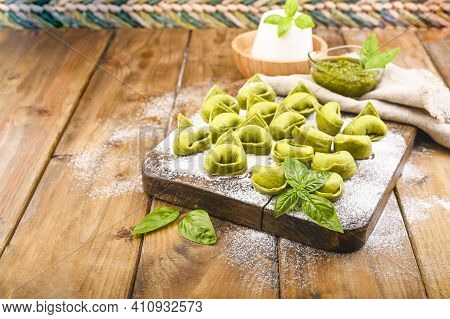 Tortellini E Tortelloni Typical Dishes Emilia Italy. Food Background With Homemade Raw Italian Torte
