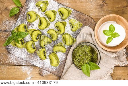 Tortellini E Tortelloni Typical Dishes Emilia Italy. Food Background With Homemade Raw Italian Torte