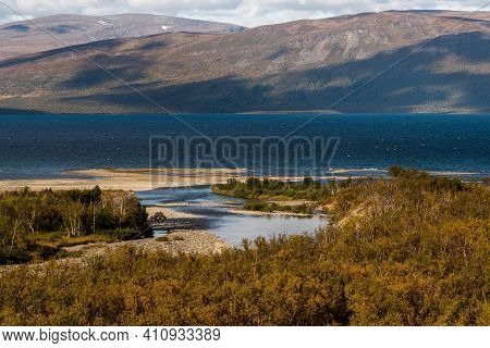 Autumn Landscape With Tornetrask Lake And Mountains. Northern Sweden
