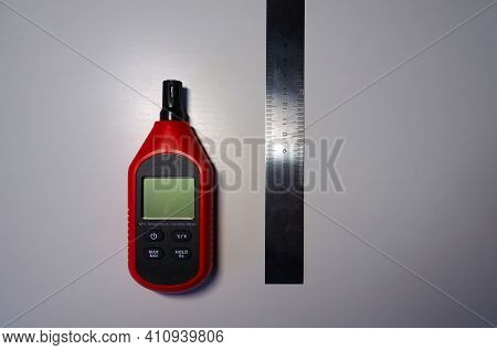 Hygrometer For Measuring Air Humidity, Close-up And Details. A Device For Measuring Humidity And Tem