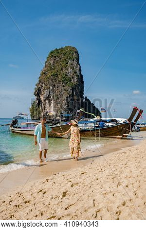 Couple Mid Age On A Tropical Beach In Thailand, Tourist On A White Tropical Beach, Railay Beach With
