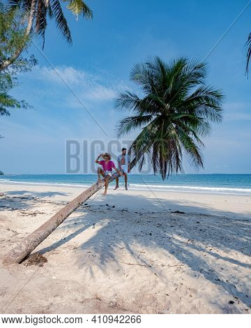 Couple On Vacation In Thailand, Chumpon Province, White Tropical Beach With Palm Trees, Wua Laen Bea