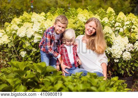 Family Weekend Outdoor On Sunny Summer Day