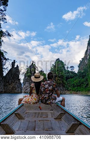 Couple On Longtail Boat Visiting Khao Sok National Park In Phangnga Thailand, Khao Sok National Park