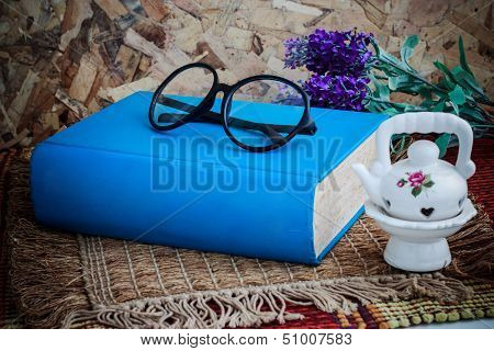 Book And Glasses