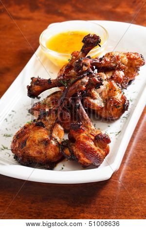 Chicken wings with sauce