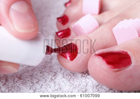 Female Feet Red Polished Nails