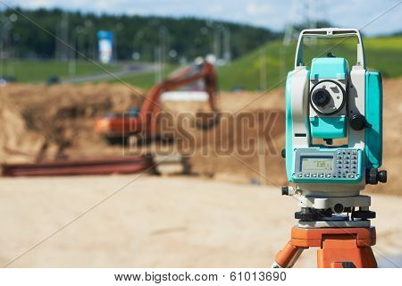 Surveyor equipment tacheometer or theodolite outdoors at construction site