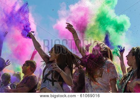 People Celebrating Holi Festival Of Colors.