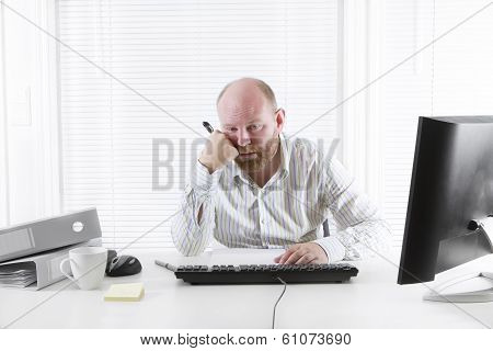 Overworked and Tired Businessman