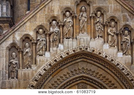 Religious Sculptures On The Facade Of Jak Chapel In Budapest