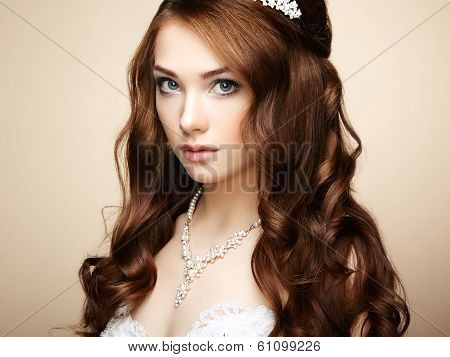 Portrait Of Beautiful Sensual Woman With Elegant Hairstyle. Wedding Dress
