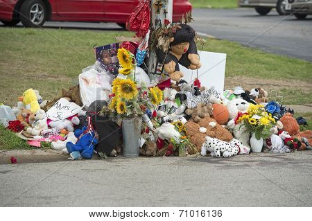 FERGUSON, MO/USA - AUGUST 30, 2014: A makeshift memorial near where black teenager Michael Brown was shot to death by police in Ferguson, Missouri.