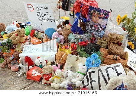 FERGUSON, MO/USA - AUGUST 30, 2014: A makeshift memorial near where black teenager Michael Brown was shot to death by police in Ferguson, Missouri.