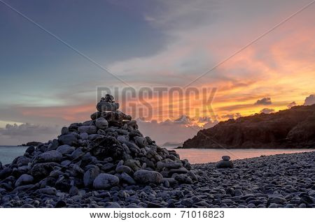 Cairn On Rock Beach Light