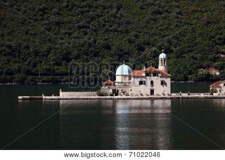 PERAST, MONTENEGRO - JUNE 08: Church of Our Lady of the Rocks, Perast, Montenegro, on June 08, 2012 