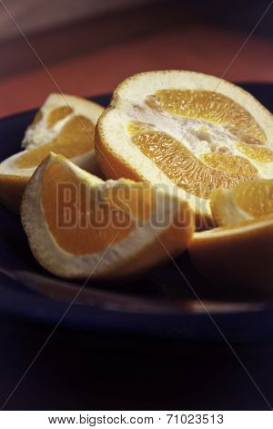 Orange Wedges on a Plate