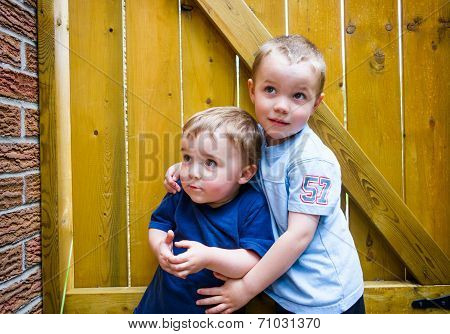 Two Boys Together Looking Up