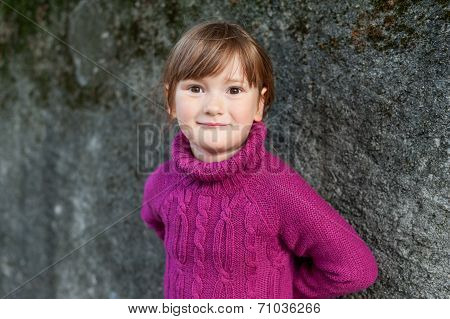 Outdoor portrait of a cute little girl