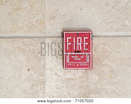 Fire Alarm Switch On Brown Wall