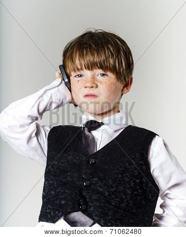 Emotional Red-haired Boy With Mobile Phone
