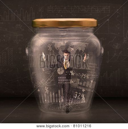 Businessman traped in jar with graph chart symbols concept on background