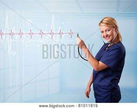 Pretty young medical doktor listening to red pulse and heart rates
