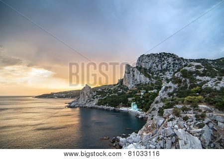 Sunset landscape with Cat Mountain in Blue Bay near Simeiz town Crimea, Russia