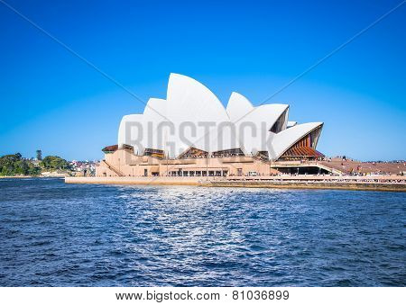 SYDNEY, AUSTRALIA - DECEMBER 21, 2014: The Iconic Sydney Opera House is a multi-venue performing arts centre also containing bars and outdoor restaurants. December 21, 2014 in Sydney, Australia.