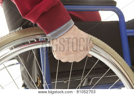 Wheelchair user makes various movements with his wheelchair, exercises for safety handling