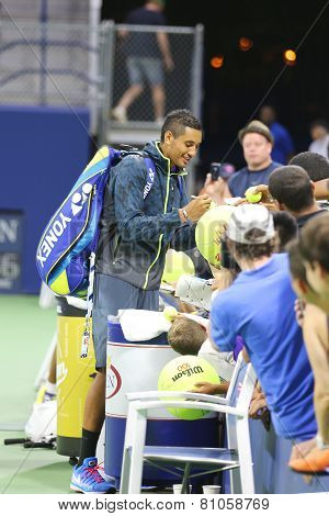 Professional tennis player Nick Kyrgios from Australia signing autographs after win at US Open 2014