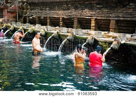People Washing At Pura Tirta Empul Temple, Bali, Indonesia