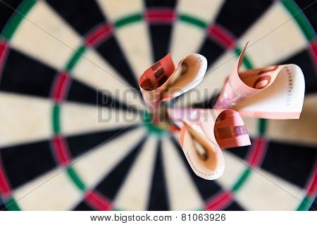 Dartboard With Steeldarts And Euro In It