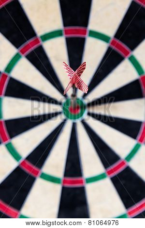 Dartboard With Steeldarts In Bullseye