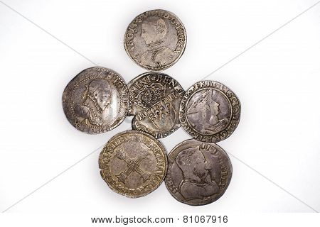 Vintage Silver Coins With Portraits On A White Background