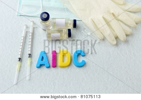 Medicines with word Aids on light background