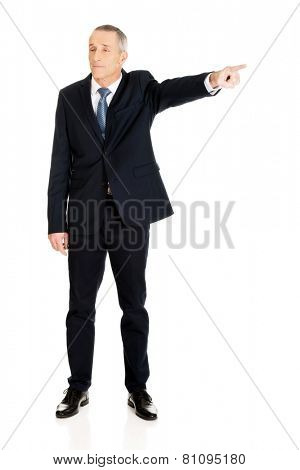 Full length boss dismissing someone.