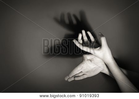 Hands gesture like deer on gray background