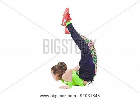 Happy little girl dancing break dance