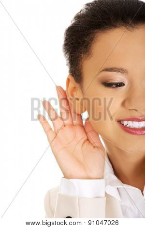 Beautiful african american businesswoman overhears.