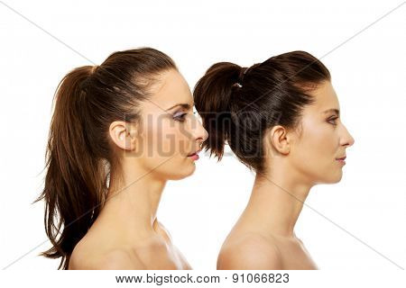 Beauty woman with make up standing behind her friend.