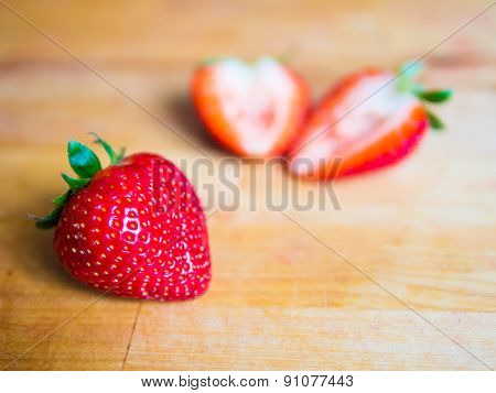 Strawberry On A Wooden Board